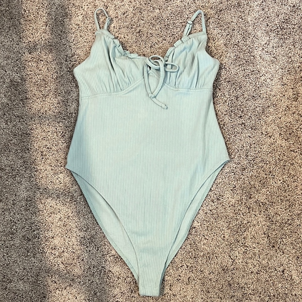 Size small body suit